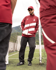 Chamarra de Presentacion Vinotinto Poly track Umbro 2026