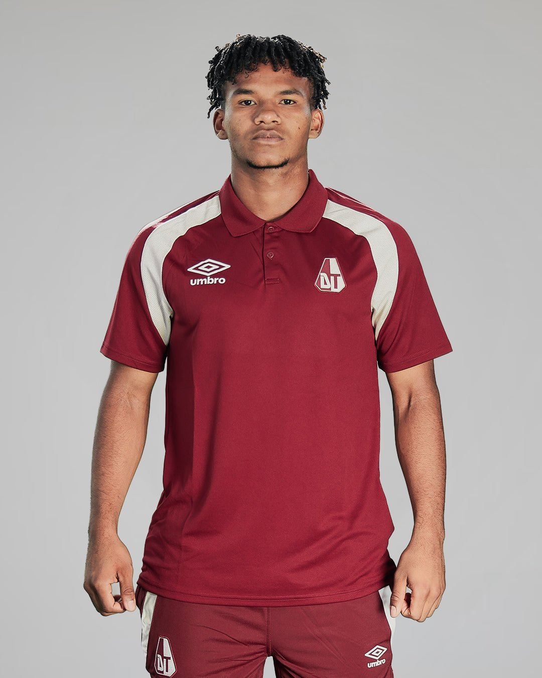 Polo Deportes Tolima de Presentación Vinotinto Umbro 2026