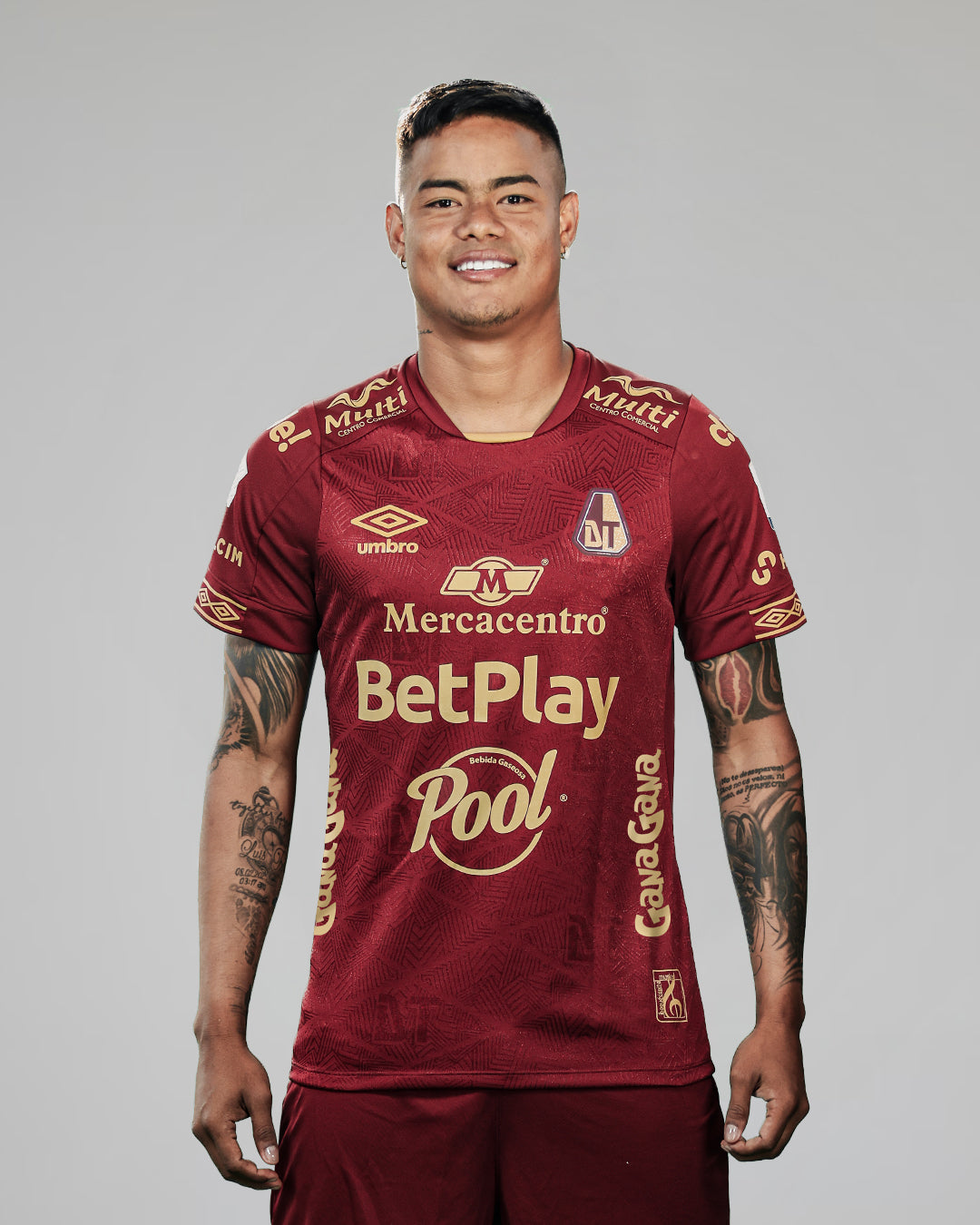 Camiseta Deportes Tolima Local Vinotinta con Logos Umbro 2026