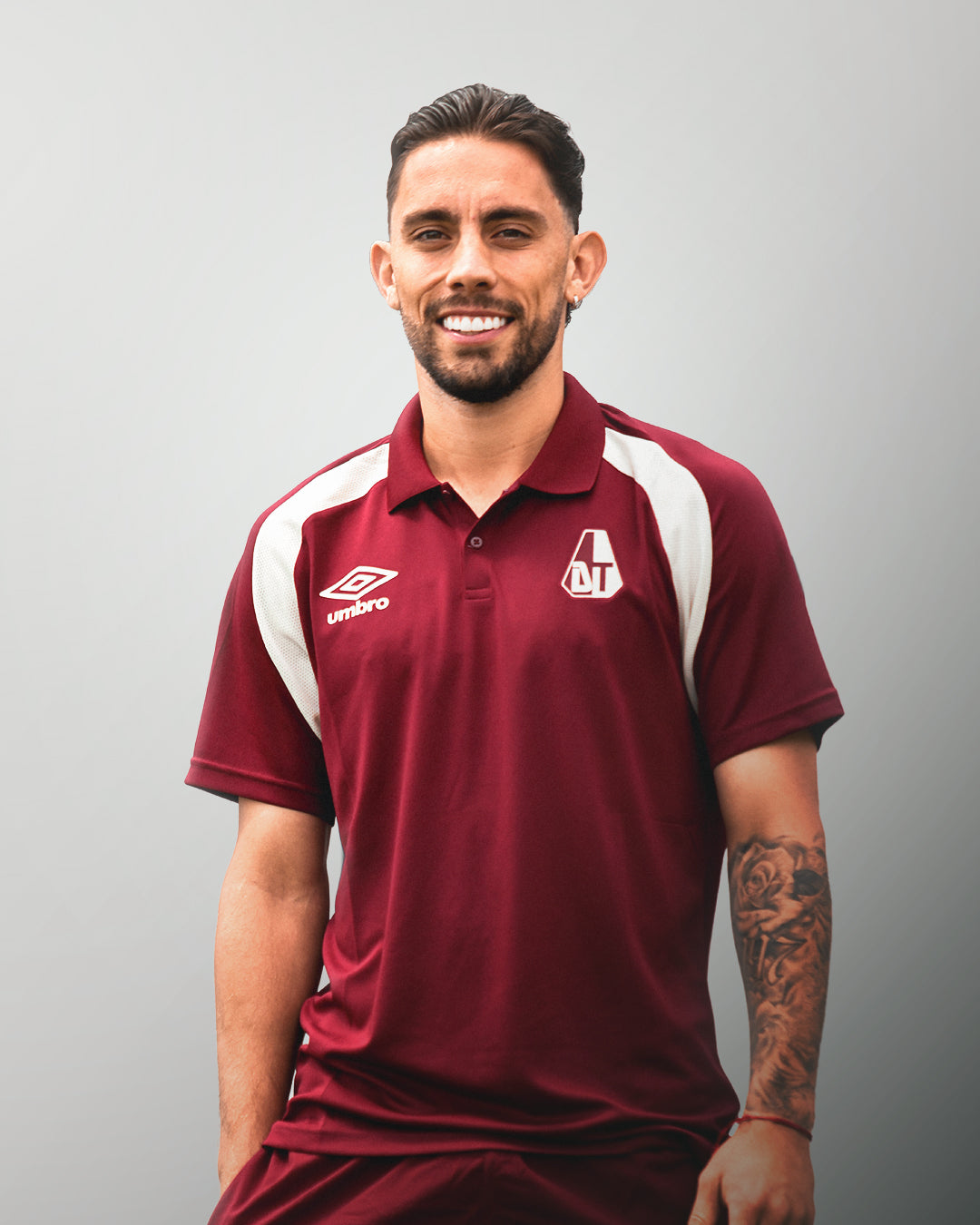 Polo Deportes Tolima de Presentación Vinotinto Dama Umbro 2026
